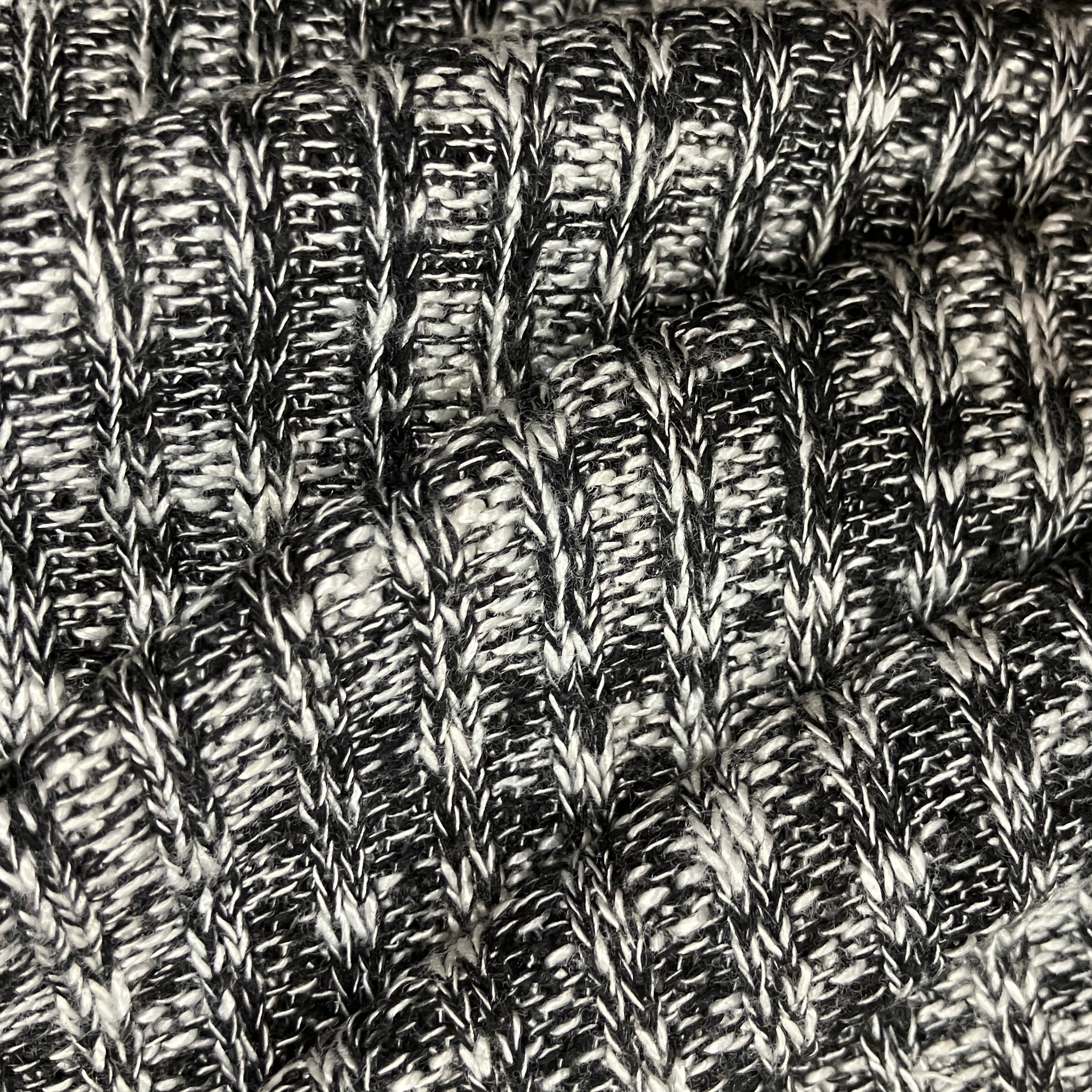 POLYESTER/ RAYON SWEATER KNIT BLACK & WHITE MARLED